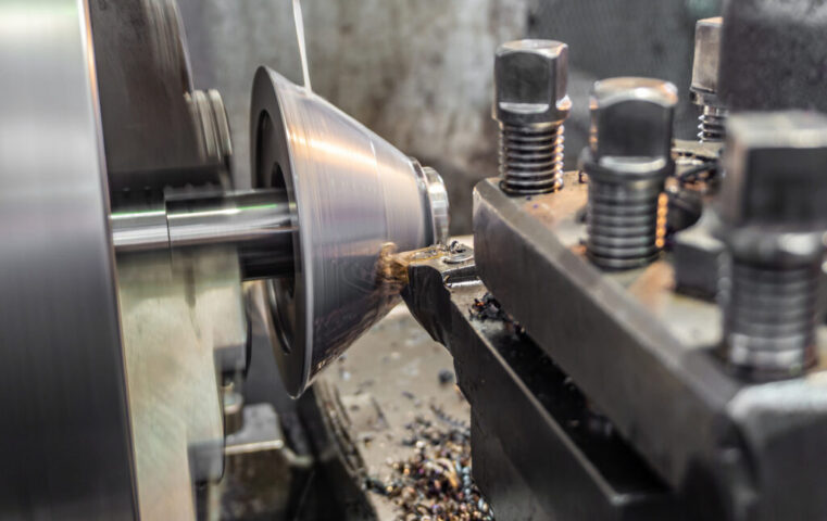 Metal cutting on a lathe. Manufacturing of parts at a machine-bu